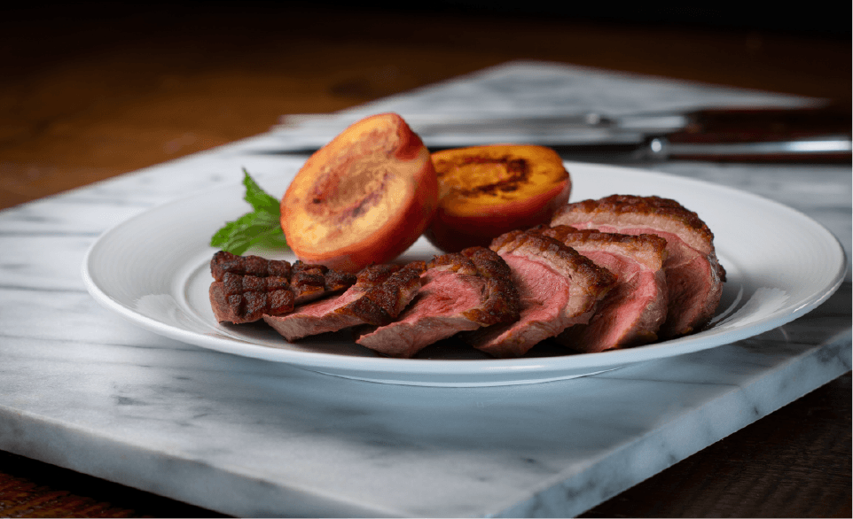 Magret Duck Steak with Grilled Peaches