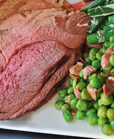 Roasted Boneless Leg of Lamb with Spring Peas - DeBragga